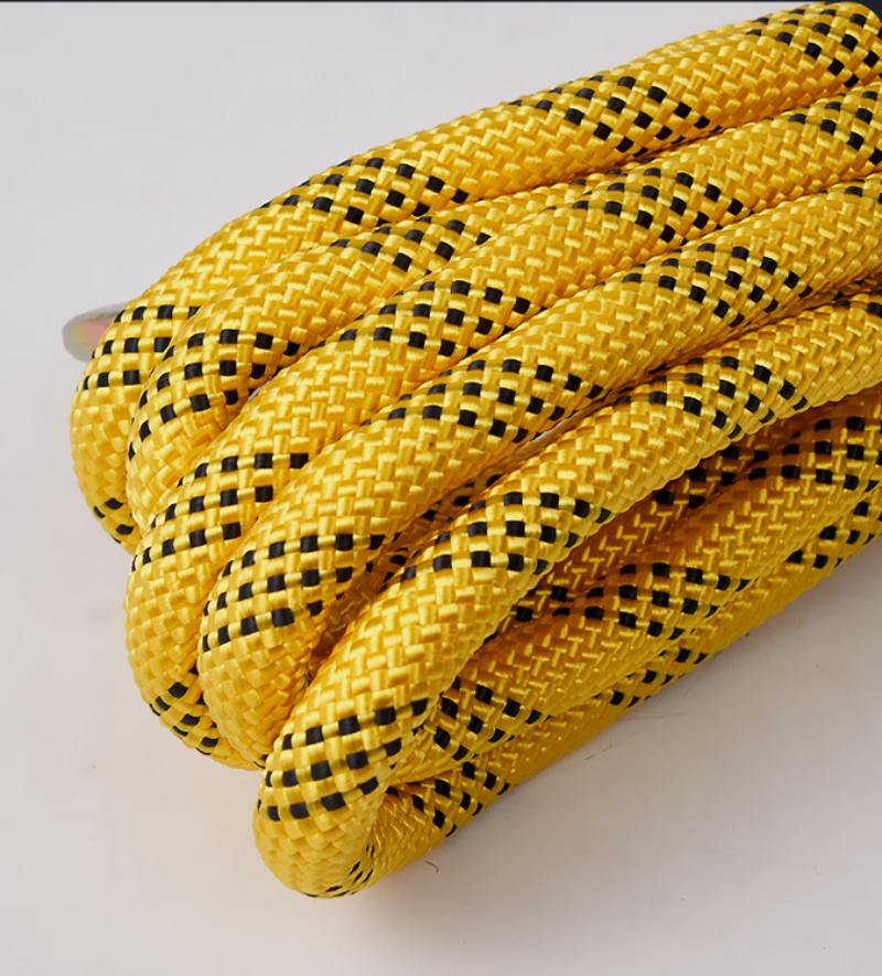 extreme 4x4 towing closeup yellow braided rope Close-up view of yellow braided towing rope for extreme 4x4 recovery