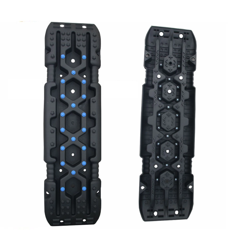 Front and back view of black heavy duty traction boards with enhanced grip bolts