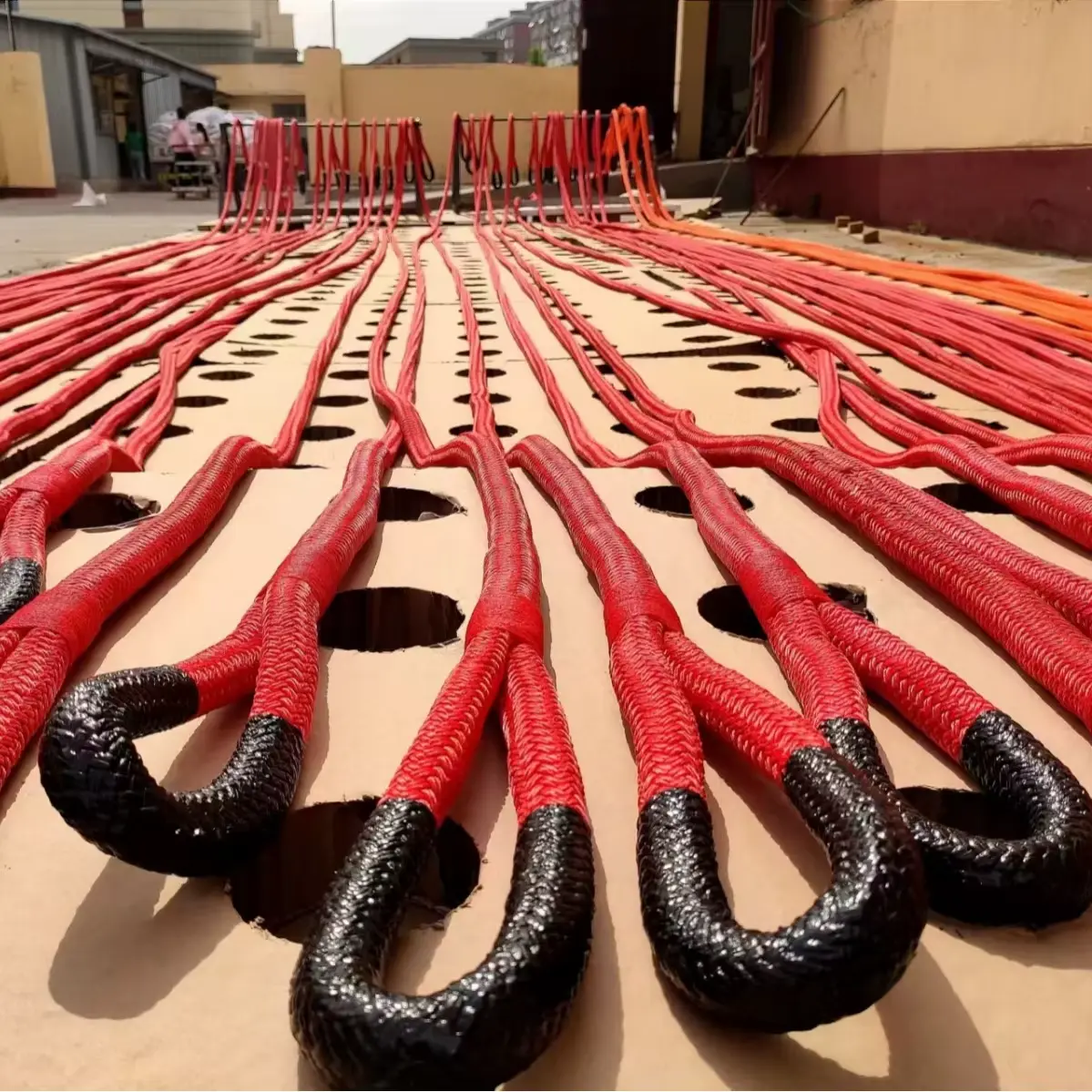 Red nylon heavy duty recovery straps with reinforced loops for 4x4 and off-road towing