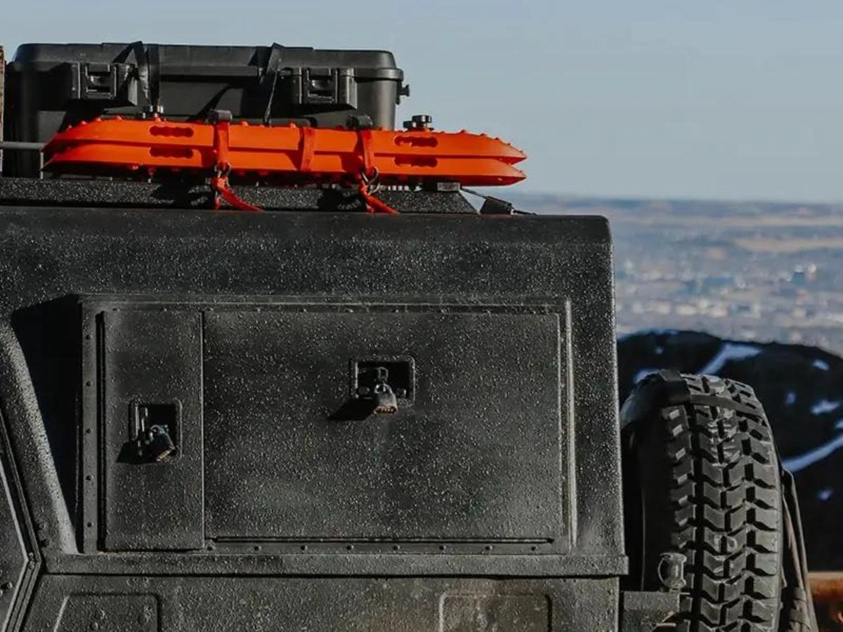 Heavy duty traction boards mounted on the rear of an off-road vehicle