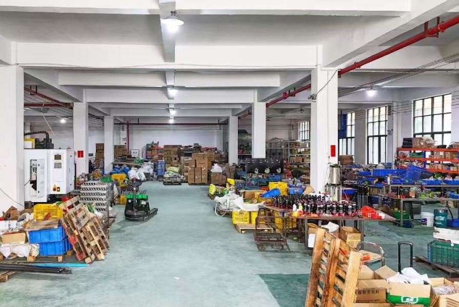 AutoGuard workshop material storage area with organized shelves and packing section for auto parts